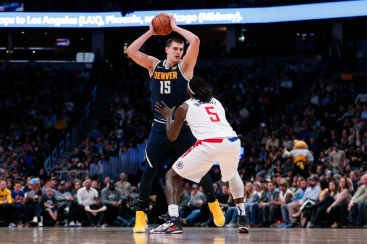 Los Angeles Clippers forward Montrezl Harrell (5) guards Denver Nuggets center Nikola Jokic (15) in the second quarter at the Pepsi Center.