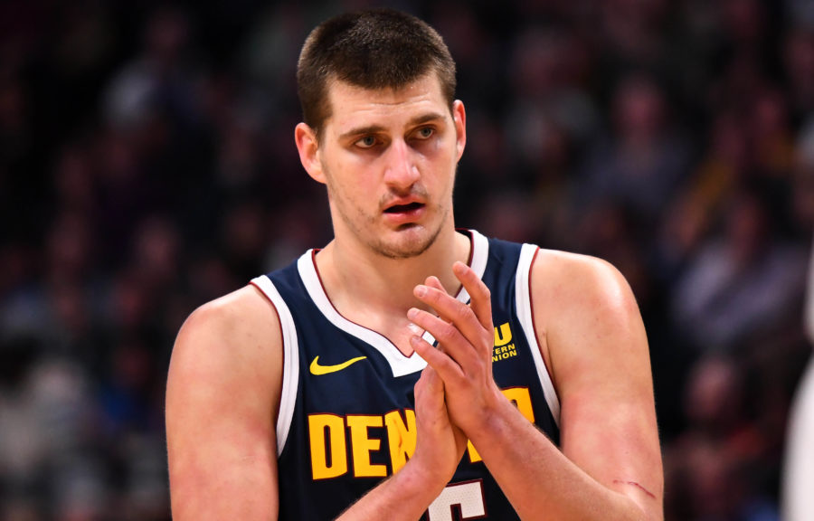 Denver Nuggets center Nikola Jokic (15) claps in the second half against the Chicago Bulls at the Pepsi Center.