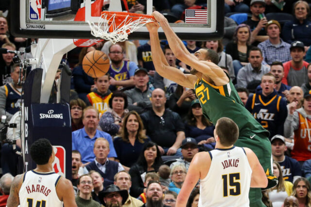 Utah Jazz center Rudy Gobert (27) dunks the basketball during the second quarter against the Denver Nuggets at Vivint Smart Home Arena.