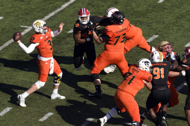 North quarterback Drew Lock of Missouri (3) passing against the South during the first quarter at Ladd-Peebles Stadium.