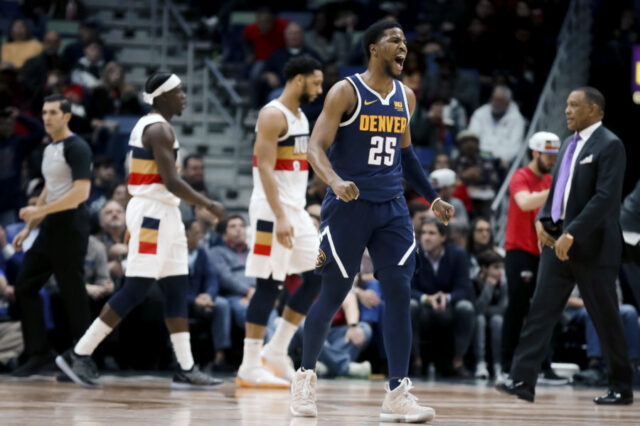 New Orleans, LA, USA; Denver Nuggets guard Malik Beasley (25) reacts after scoring against the New Orleans Pelicans during the second half at the Smoothie King Center.