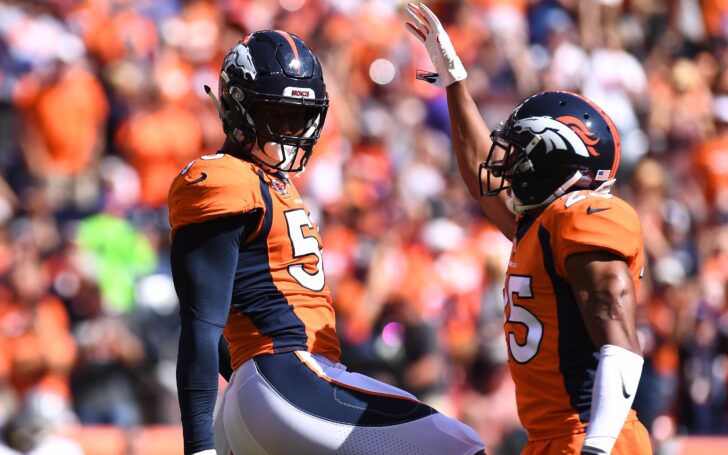 Von Miller and Chris Harris. Credit: Ron Chenoy, USA TODAY Sports.