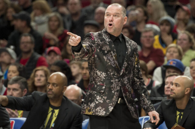 Denver Nuggets head coach Michael Malone instructs players during the first half against the Portland Trail Blazers at Moda Center.