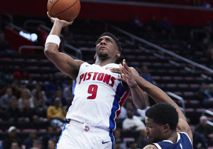 Detroit Pistons guard Langston Galloway (9) charges into Denver Nuggets guard Malik Beasley (25) in the second half at Little Caesars Arena.