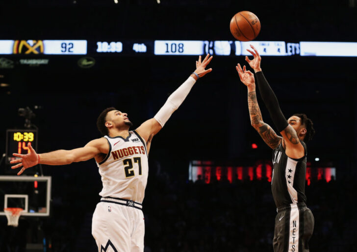 Brooklyn, NY, USA; Brooklyn Nets guard D'Angelo Russell (1) shoots against Denver Nuggets guard Jamal Murray (27) during the second half at Barclays Center.