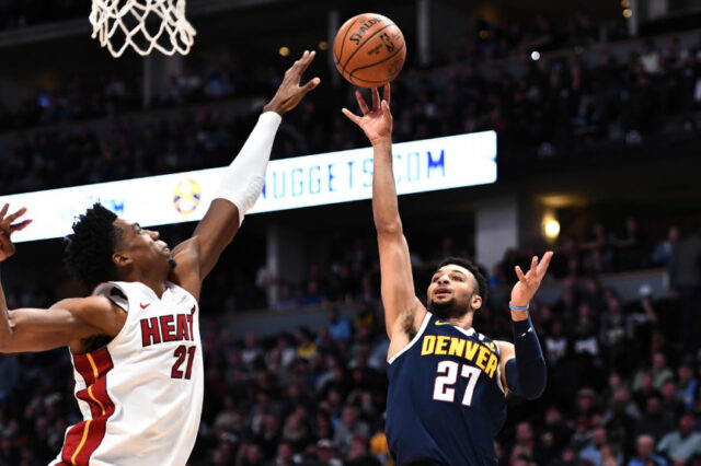 Denver Nuggets guard Jamal Murray (27) shoots over Miami Heat center Hassan Whiteside (21) in the second quarter at the Pepsi Center.