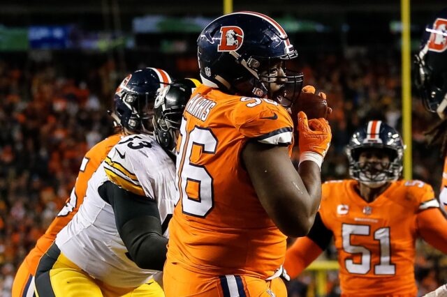 Shelby Harris picks off Ben Roethlisberger. Credit: Isaiah J. Downing, USA TODAY Sports.