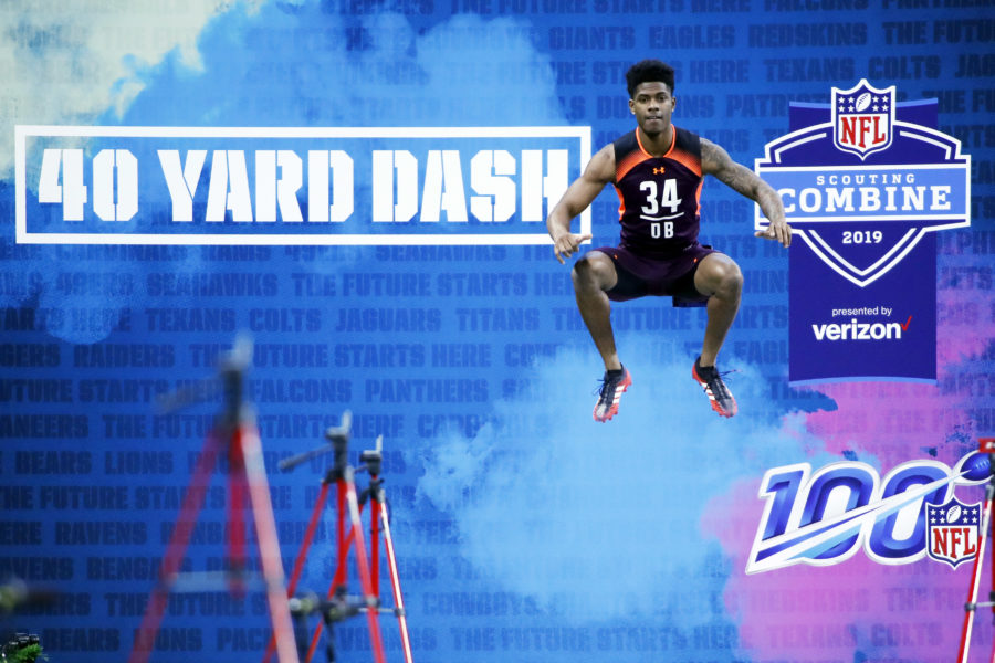 Louisiana State defensive back Greedy Williams (DB34) jumps up to stretch before running the 40 yard dash during the 2019 NFL Combine at Lucas Oil Stadium.