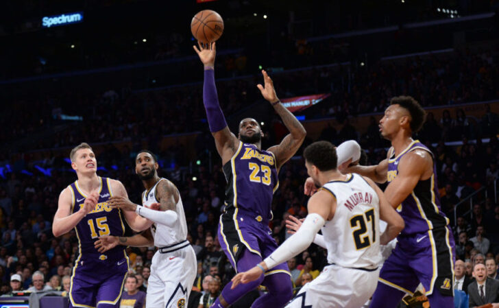 Los Angeles Lakers forward LeBron James (23) moves to the basket against Denver Nuggets guard Jamal Murray (27) during the second half at Staples Center.