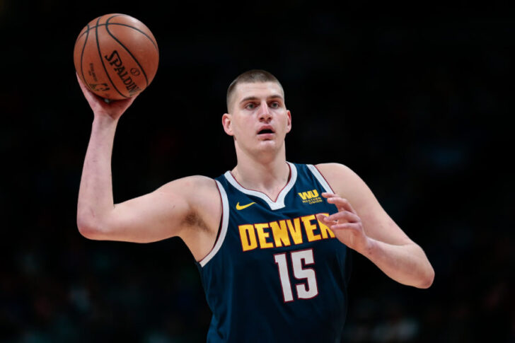 Denver Nuggets center Nikola Jokic (15) controls the ball in the first quarter against the Dallas Mavericks at the Pepsi Center.