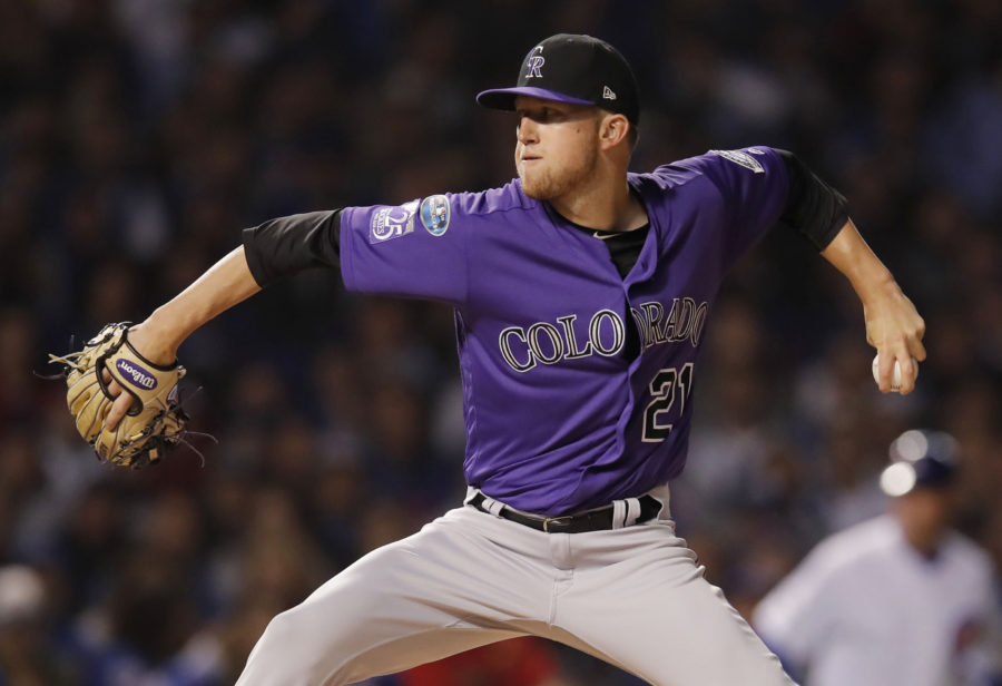 Colorado Rockies starting pitcher Kyle Freeland throws a pitch against the Chicago Cubs in the 2018 National League wild card playoff baseball game at Wrigley Field.