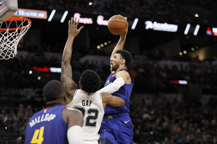 Denver Nuggets point guard Jamal Murray (27) dunks the ball over San Antonio Spurs small forward Rudy Gay (22) in game four of the first round of the 2019 NBA Playoffs at AT&T Center.