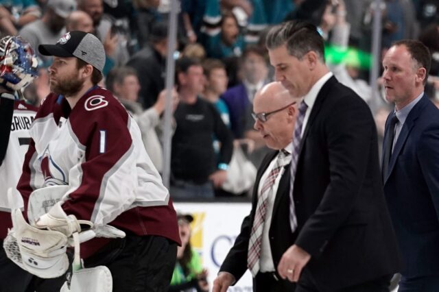 Jared Bednar leaves the ice. Credit: Stan Szetso, USA TODAY Sports.