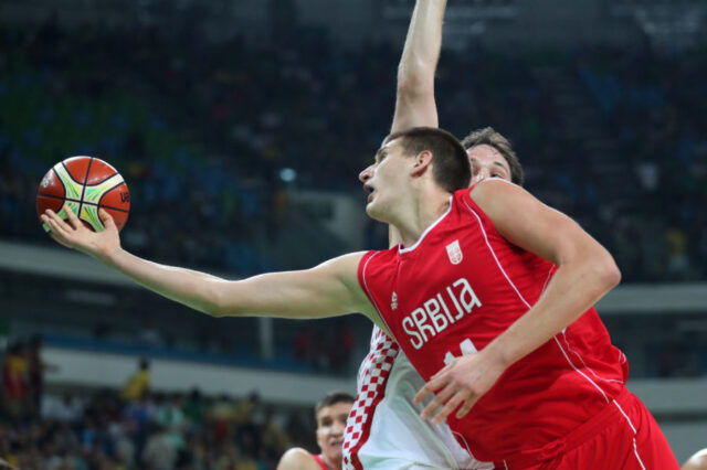 Serbia center Nikola Jokic (14) shoots the ball against Croatia during the men's basketball quarterfinals in the Rio 2016 Summer Olympic Games at Carioca Arena 1.