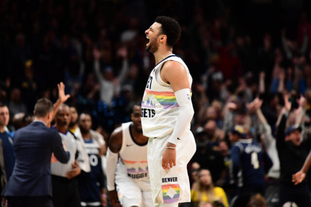 Denver Nuggets guard Jamal Murray (27) reacts after his three point basket in the fourth quarter against the Minnesota Timberwolves at the Pepsi Center.