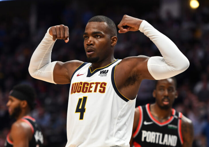 Denver Nuggets forward Paul Millsap (4) reacts following a basket and foul in the third quarter against the Portland Trail Blazers in game five of the second round of the 2019 NBA Playoffs at Pepsi Center.