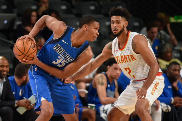 Dallas Mavericks guard PJ Dozier (35) is guarded by Atlanta Hawks guard Tyler Dorsey (2) during the first half at McCamish Pavilion.