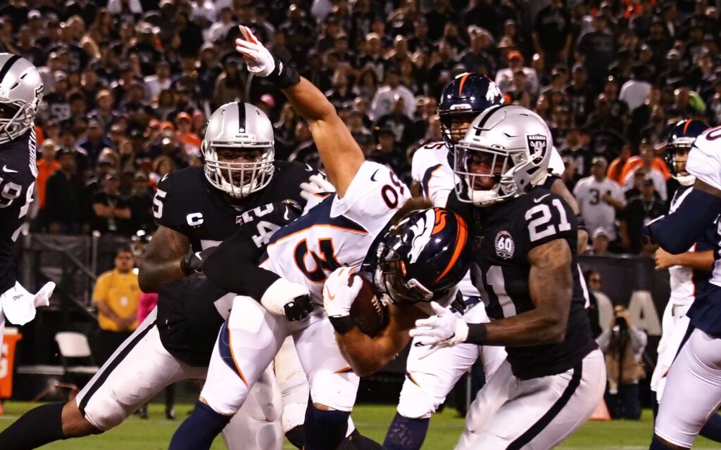 Phillip Lindsay tackled. Credit: Kelley L. Cox, USA TODAY Sports.