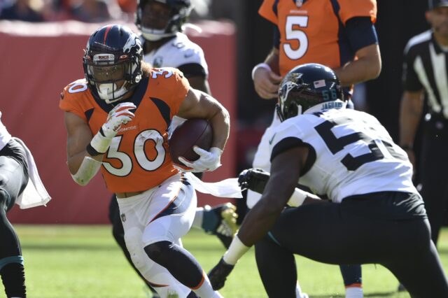 Phillip Lindsay on his 28-yard run. Credit: Michael Madrid, USA TODAY Sports.