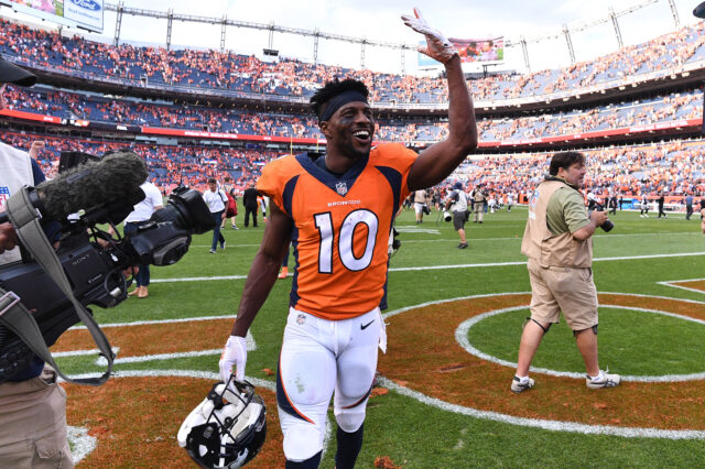 Denver Broncos wide receiver Emmanuel Sanders (10) celebrates the win over the Oakland Raiders at Broncos Stadium at Mile High.