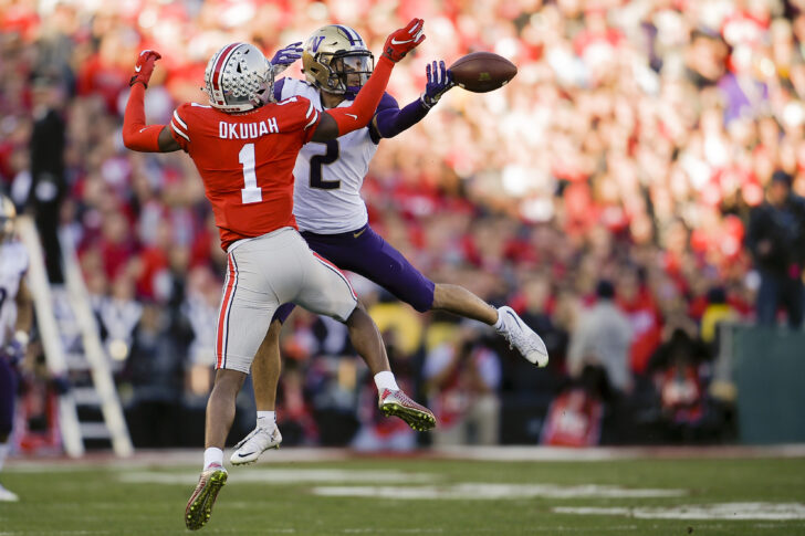 Ohio State Buckeyes cornerback Jeffrey Okudah (1) breaks up a pass for Washington Huskies wide receiver Aaron Fuller (2) in the 2019 Rose Bowl at Rose Bowl Stadium