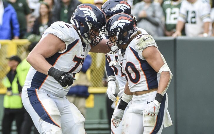 Bolles and Phillip Lindsay celebrate. Credit: Benny Sieu, USA TODAY Sports.