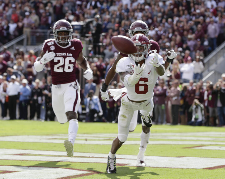 Alabama wide receiver DeVonta Smith (6) misses a pass from quarterback Tua Tagovailoa in the first quarter against Texas A&M at Kyle Field.