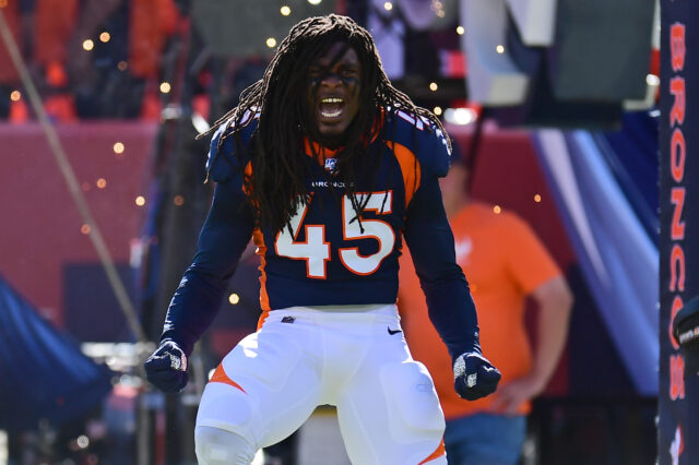 Denver Broncos linebacker Alexander Johnson (45) enters the field before the game against the Tennessee Titans at Empower Field at Mile High.