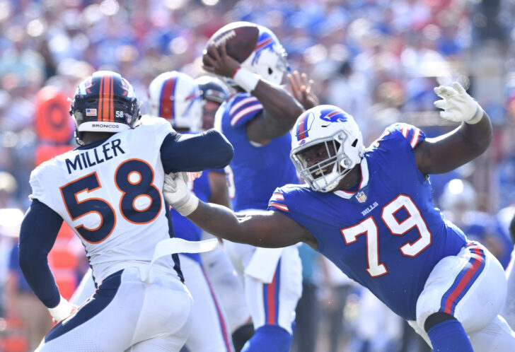 Buffalo Bills offensive tackle Jordan Mills (79) tries to keep Denver Broncos outside linebacker Von Miller (58) off of his quarterback on a pass rush during the fourth quarter of a game at New Era Field.