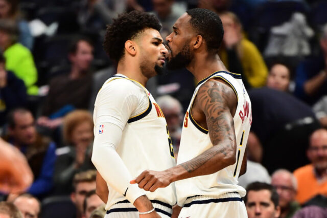 Denver Nuggets forward Will Barton (5) celebrates his basket with guard Jamal Murray (27) in the first quarter against the Miami Heat at the Pepsi Center.