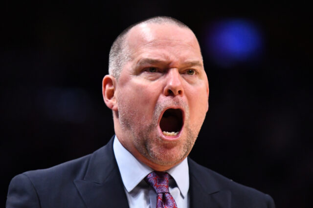 Denver Nuggets head coach Michael Malone reacts to a foul called in the second half against the Utah Jazz at the Pepsi Center.