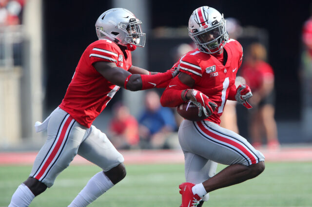 Ohio State Buckeyes cornerback Jeff Okudah (1) is congratulated by safety Jordan Fuller (4) following his interception during the first half against the Miami (Oh) Redhawks at Ohio Stadium.