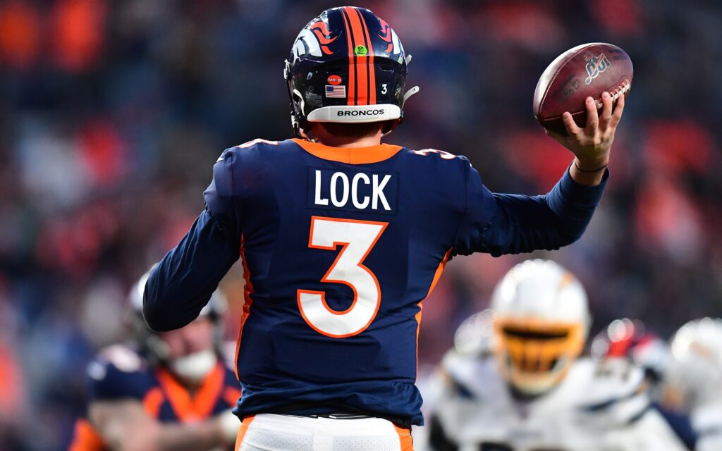 Drew Lock passes in his first game. Credit: Ron Chenoy, USA TODAY Sports.