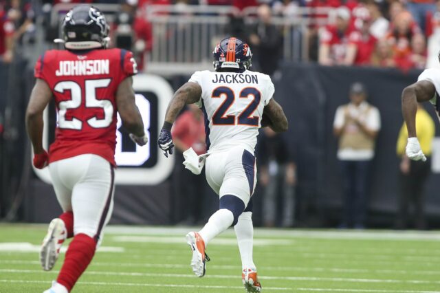 Kareem Jackson on the way to the end zone on Sunday in Houston. Credit: John Glaser, USA TODAY Sports.