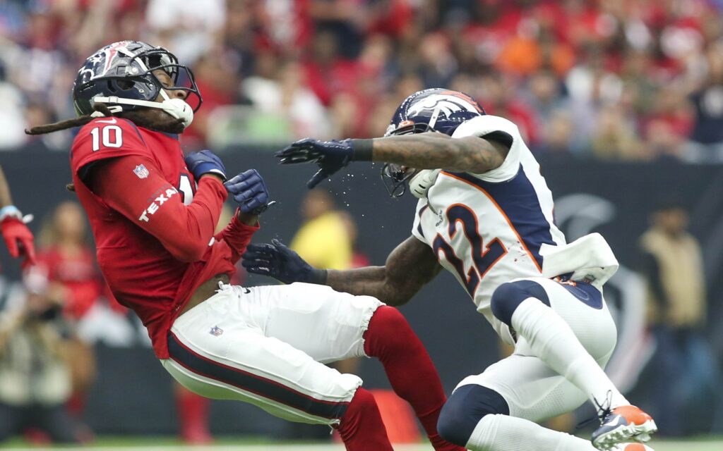 Kareem Jackson's slobber-knocking hit on DeAndre Hopkins. Credit: John Glaser, USA TODAY Sports.