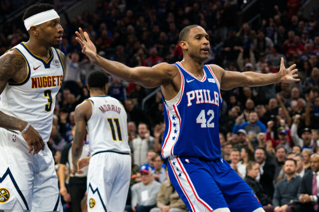 Philadelphia 76ers center Al Horford (42) reacts in front of Denver Nuggets forward Torrey Craig (3) after dunking the ball during the third quarter at Wells Fargo Center.