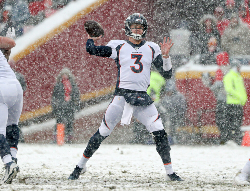 Denver Broncos quarterback Drew Lock (3) throws a pass against the Kansas City Chiefs during the second half at Arrowhead Stadium.