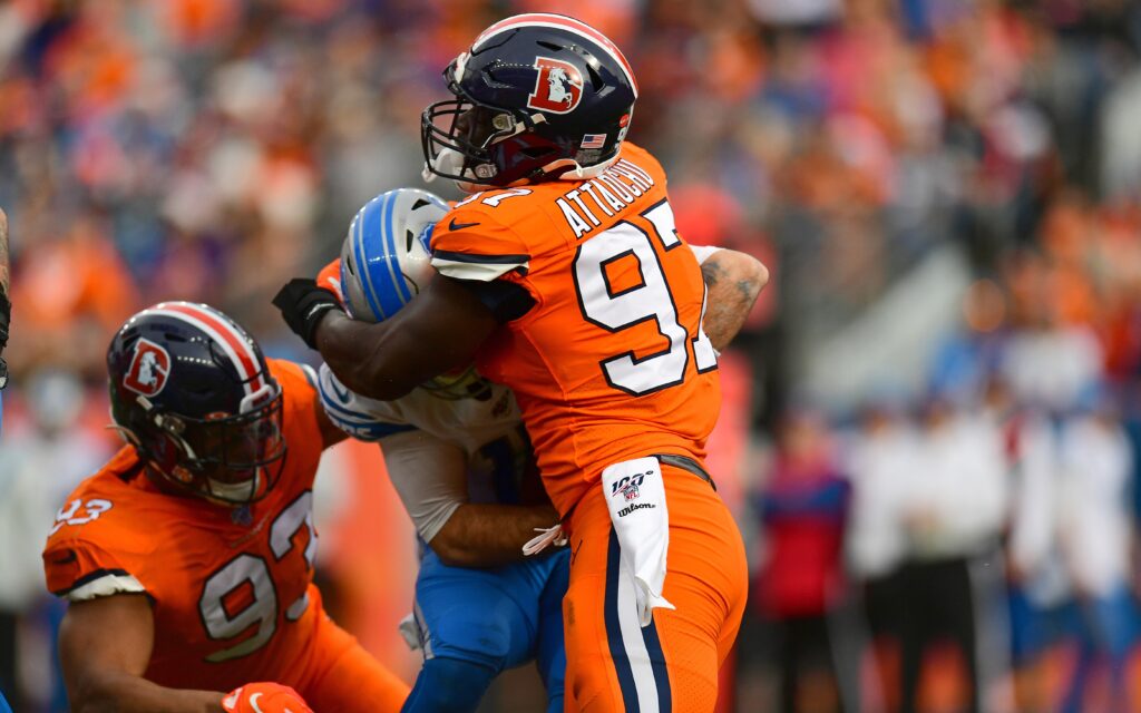 Dre'Mont Jones (93) earns his half a sack against David Blough of the Detroit Lions. Credit: Ron Chenoy, USA TODAY Sports.