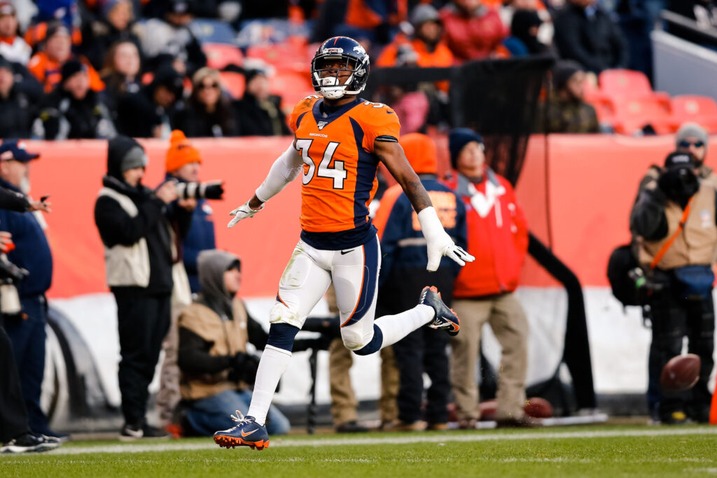 Denver Broncos strong safety Will Parks (34) reacts after a play in the third quarter against the Oakland Raiders at Empower Field at Mile High.