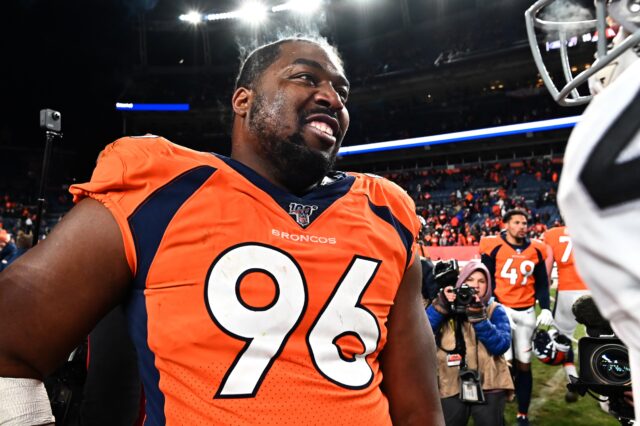 Shelby Harris celebrates the Broncos win over the Raiders. Credit: Ron Chenoy, USA TODAY Sports.