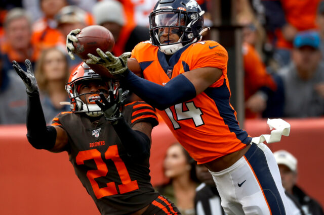 Denver Broncos wide receiver Courtland Sutton (14) pulls in a touchdown pass as Cleveland Browns cornerback Denzel Ward (21) defends during the first half of NFL football game, Sunday, Nov. 3, 2019, in Denver.