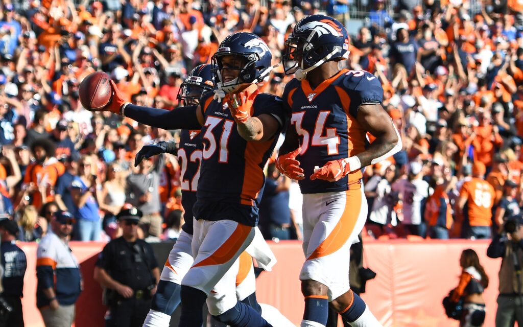 Justin Simmons and Will Parks. Credit: Ron Chenoy, USA TODAY Sports.