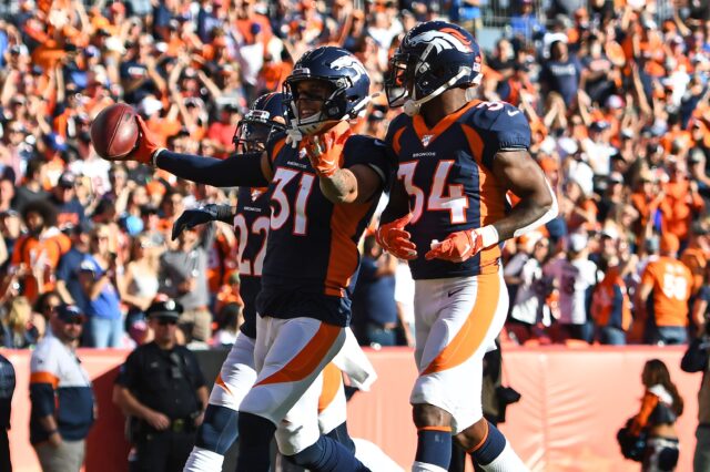 Justin Simmons and Will Parks. Credit: Ron Chenoy, USA TODAY Sports.