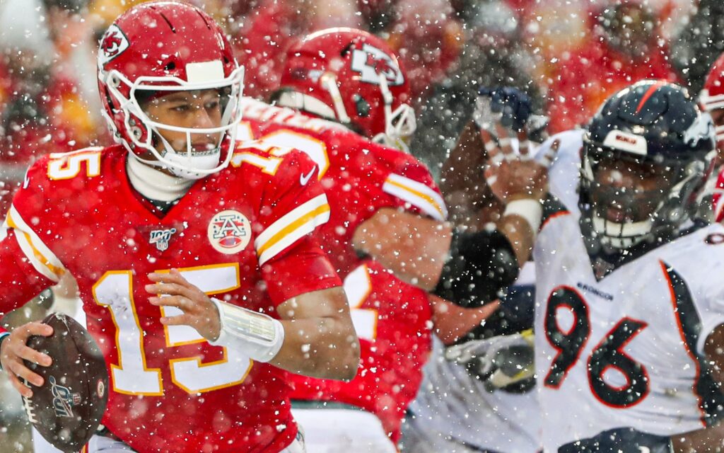 Shelby Harris rushes Patrick Mahomes. Credit: Jay Biggerstaff, USA TODAY Sports.