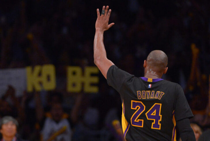 Los Angeles Lakers forward Kobe Bryant (24) waves to fans in the stands after leaving the game against the Denver Nuggets at Staples Center. The Nuggets won 116-105.