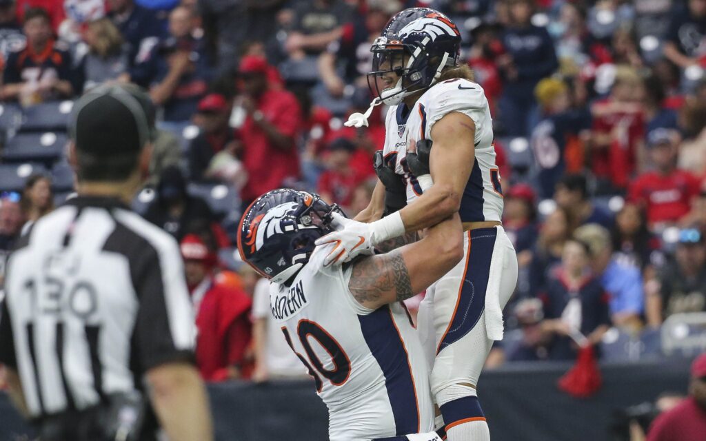 McGovern lifts Phillip Lindsay in celebration. Credit: Troy Taormina, USA TODAY Sports.