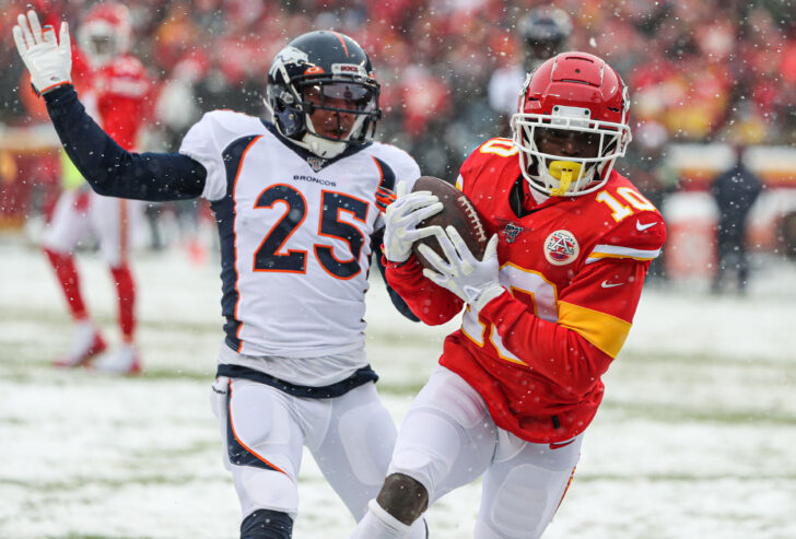 Kansas City Chiefs wide receiver Tyreek Hill (10) burns and embarrasses Denver Broncos cornerback Chris Harris (25) for a touchdown during the first half at Arrowhead Stadium.