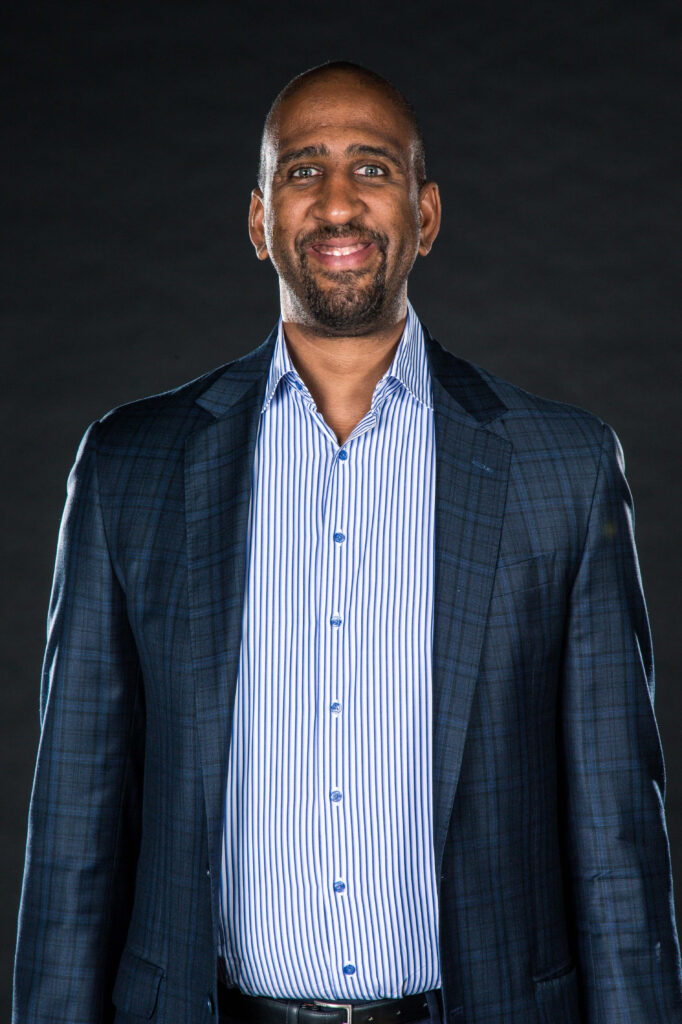 Denver Nuggets assistant general manager Calvin Booth poses for a photo during media day at the Pepsi Center.