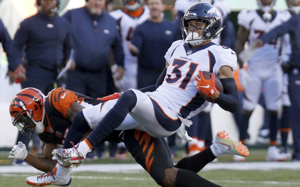 Justin Simmons picks off a pass in 2018. Credit: David Kohl, USA TODAY Sports.