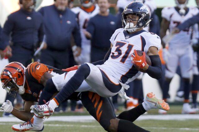 Justin Simmons picks off a pass in 2018. Credit: David Kohl, USA TODAY Sports.